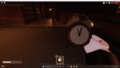 A player winding up an Alarm Clock.