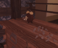 An Alarm Clock on a table in the Nest.