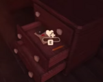 A bandage found within a container.