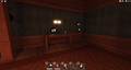 A candle on top of a drawer during normal gameplay.