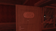 A door sign becoming scrambled by Dupe.