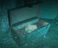 A toolbox in The Grotto containing a Bandage Pack.