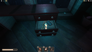 A room key in a dark room. Note how the Guiding Light is highlighting it.